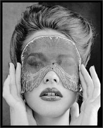 grayscale image of Beautiful Woman with rich plush lips and lace butterfly mask